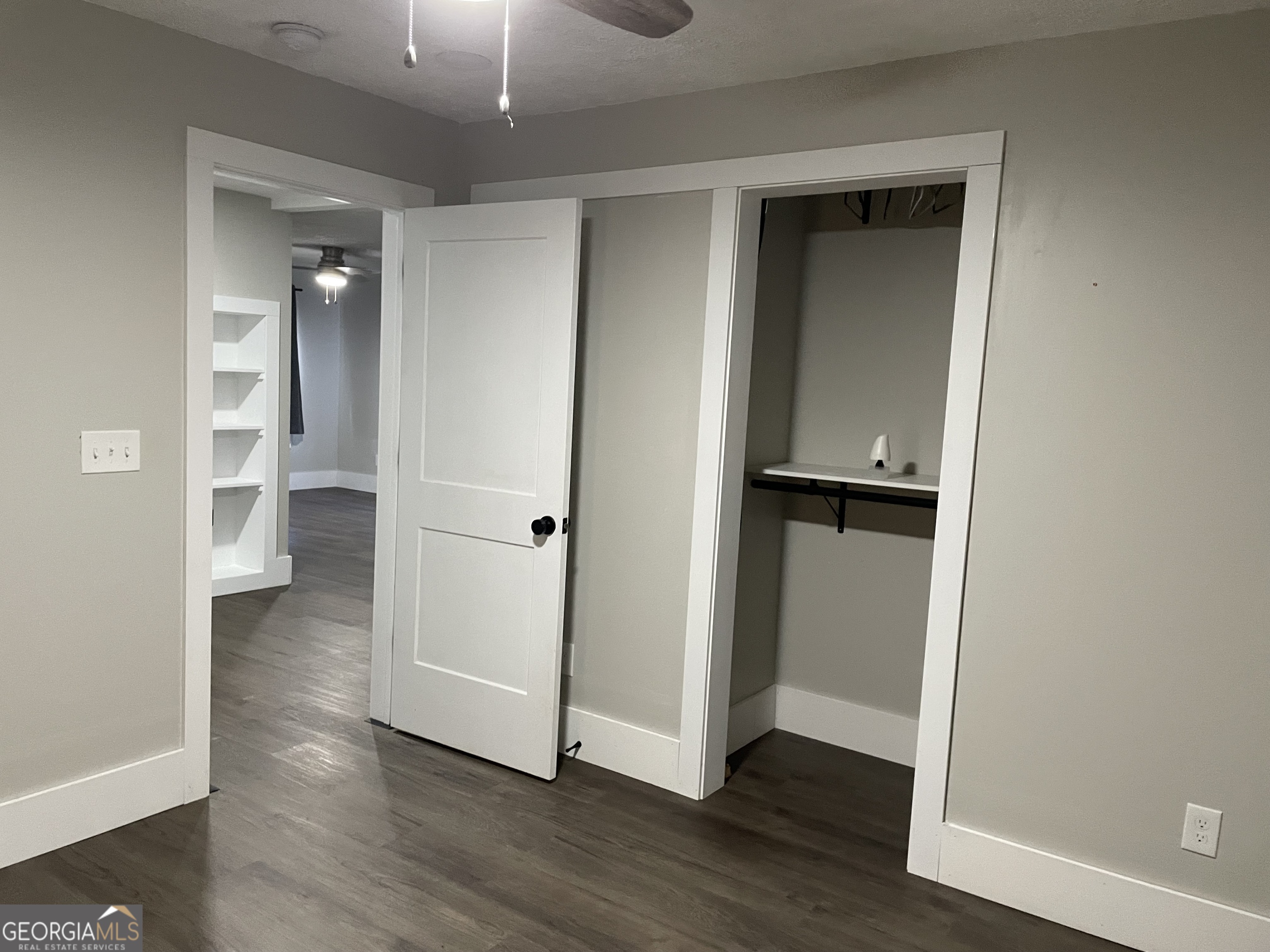 5186 Wheat Street Northeast Covington, GA 30014 - Photo 8 of 10 an empty room with wooden floor and entrance