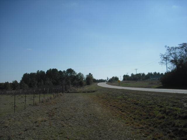 0 Magnolia Church Road Gibson, GA 30810 - Photo 1 of 1 a view of a field with wooden fence