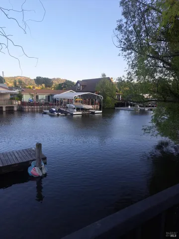a terrace of a house with outdoor seating