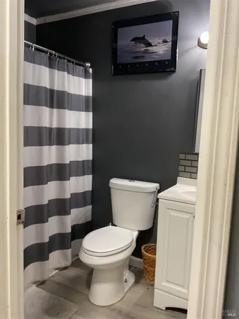 a bed room with a bed and a mirror