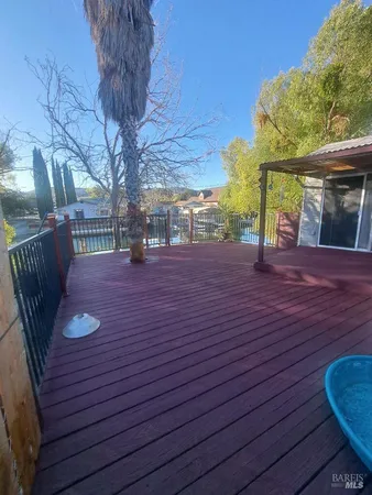 a view of a backyard with a patio