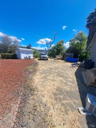 a balcony with view of outdoor space