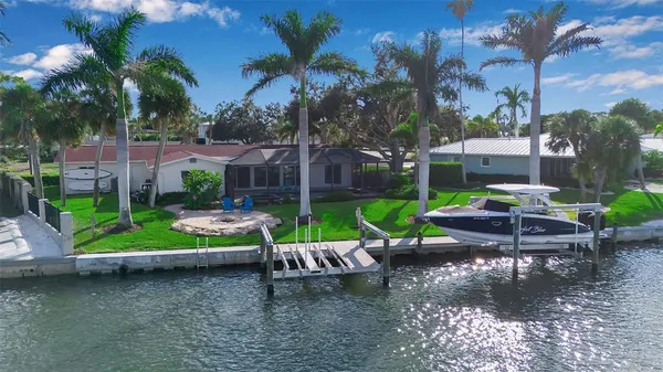 a view of a swimming pool with a porch