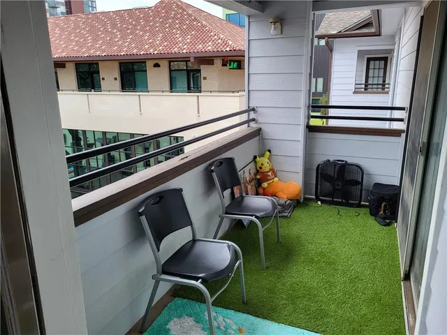 a backyard of a house with seating space