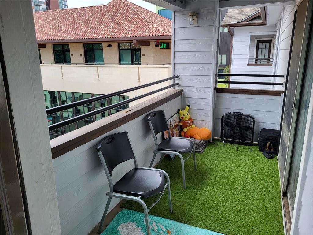 501 West 26th Street, Unit 316 Austin, TX 78705 - Photo 5 of 9 a backyard of a house with seating space