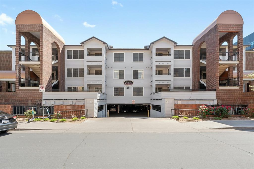 501 West 26th Street, Unit 316 Austin, TX 78705 - Photo 8 of 9 a front view of a building with multiple houses