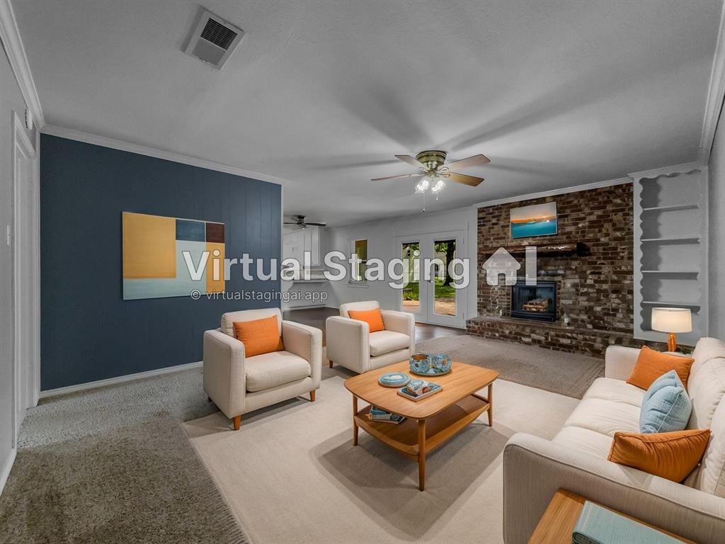 220 Cooper Drive Hurst, TX 76053 - Photo 6 of 27 a living room with furniture and a fireplace