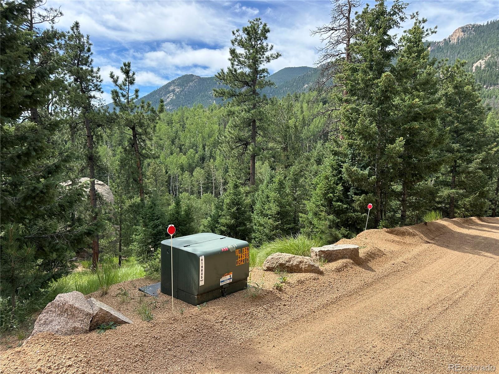 116 Happy Valley Road Manitou Springs, CO 80829 - Photo 14 of 25 a lawn chairs sitting in a yard