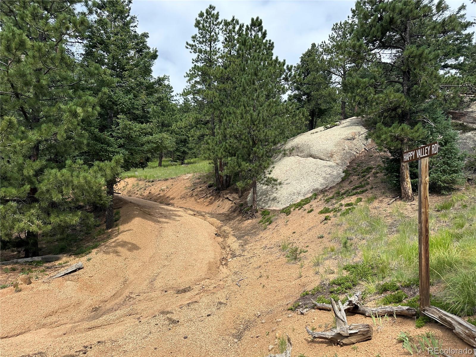 116 Happy Valley Road Manitou Springs, CO 80829 - Photo 18 of 25 a view of a backyard of the house