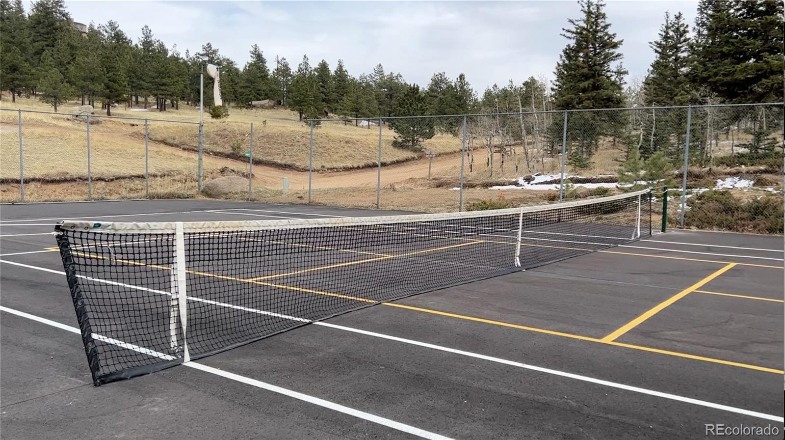 116 Happy Valley Road Manitou Springs, CO 80829 - Photo 20 of 25 a view of a tennis court