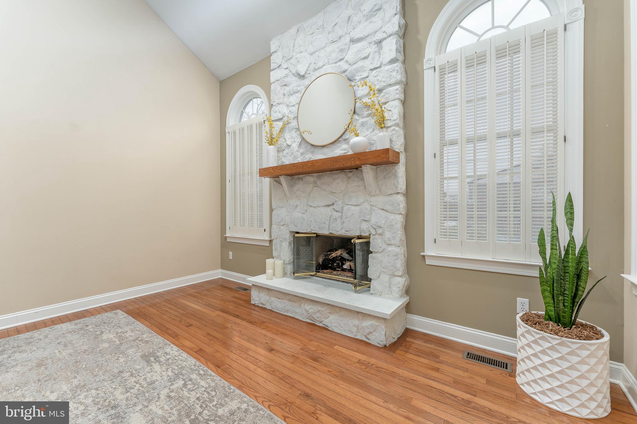 300 Bell Court Exton, PA 19341 - Photo 23 of 79 a living room with furniture and a fireplace
