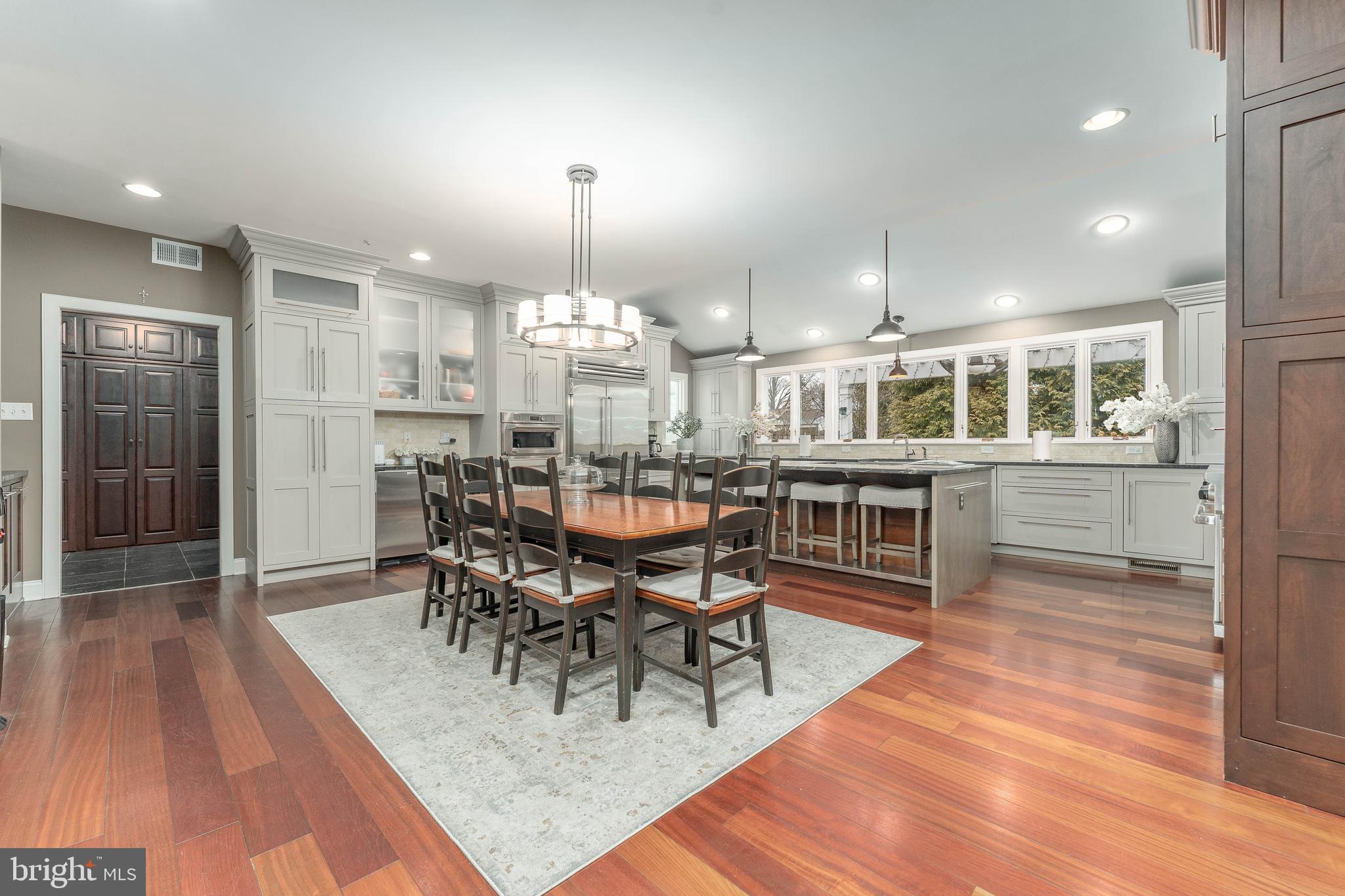 300 Bell Court Exton, PA 19341 - Photo 24 of 79 a view of a dining room with furniture and wooden floor