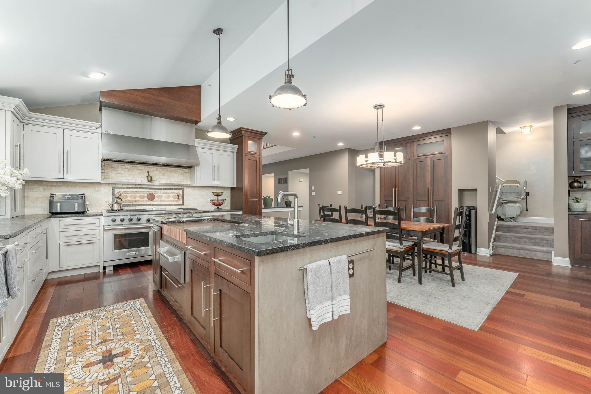 300 Bell Court Exton, PA 19341 - Photo 30 of 79 a kitchen with lots of counter top space and dining table
