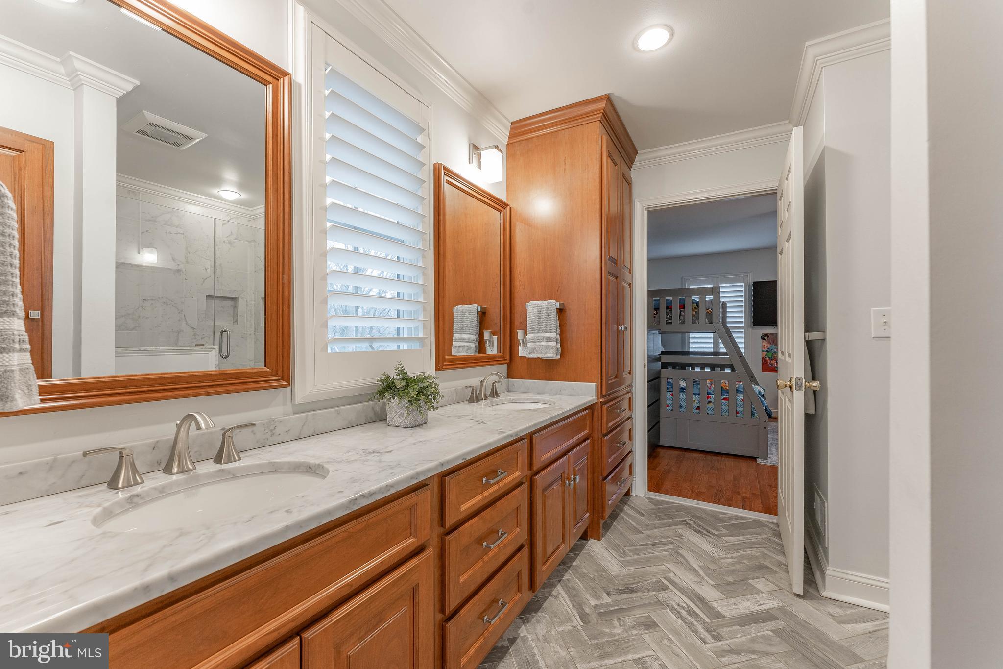 300 Bell Court Exton, PA 19341 - Photo 57 of 79 a spacious bathroom with a granite countertop sink and a mirror