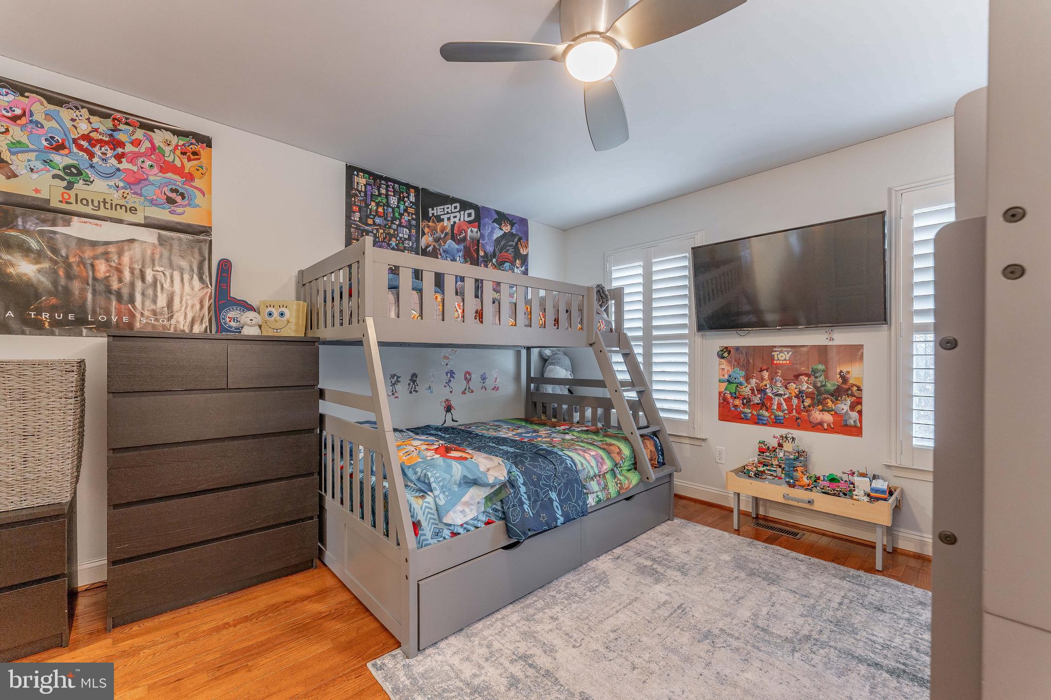 300 Bell Court Exton, PA 19341 - Photo 59 of 79 a bedroom with furniture and a flat screen tv