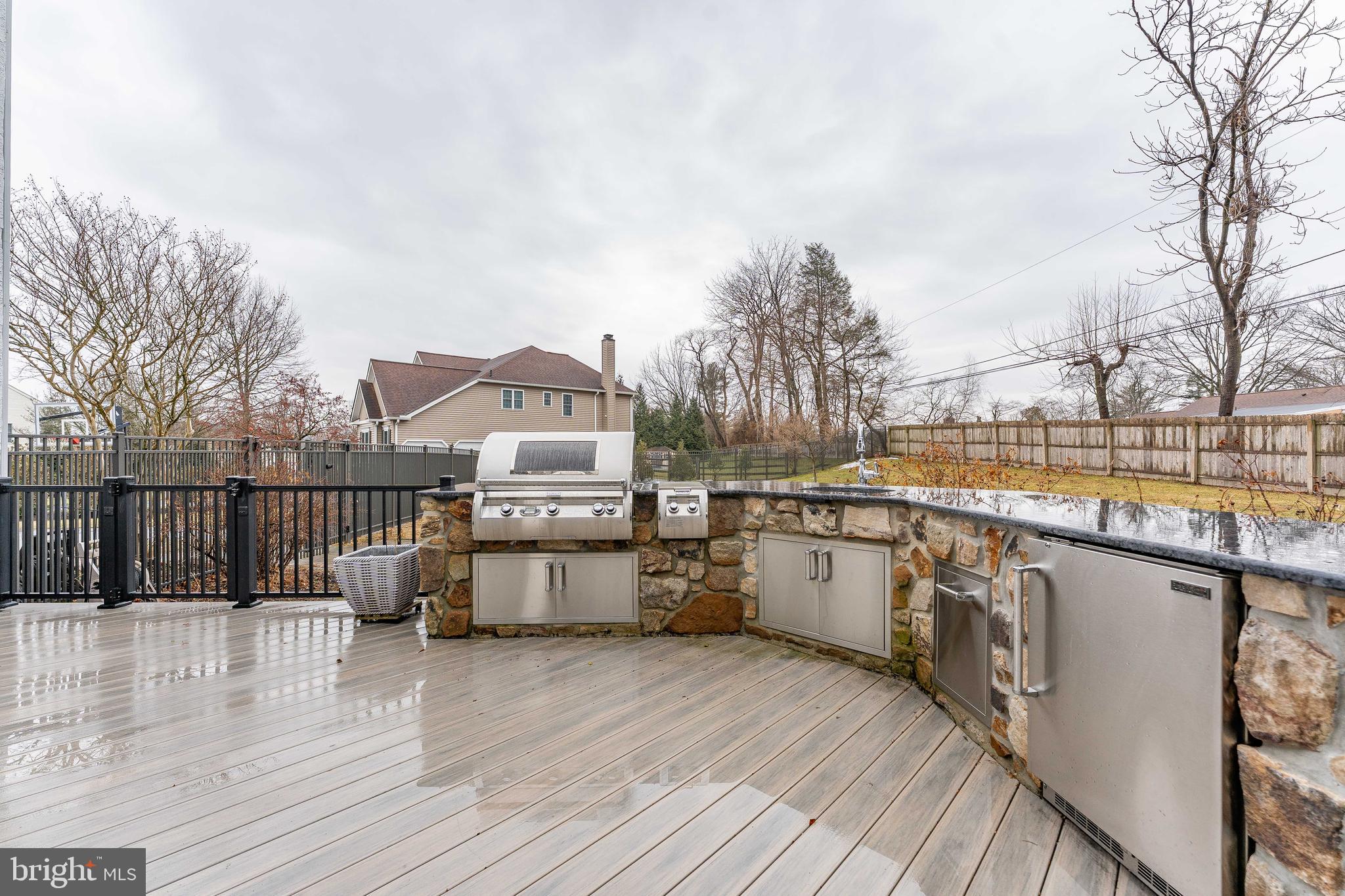 300 Bell Court Exton, PA 19341 - Photo 66 of 79 a view of a balcony with wooden floor and fence