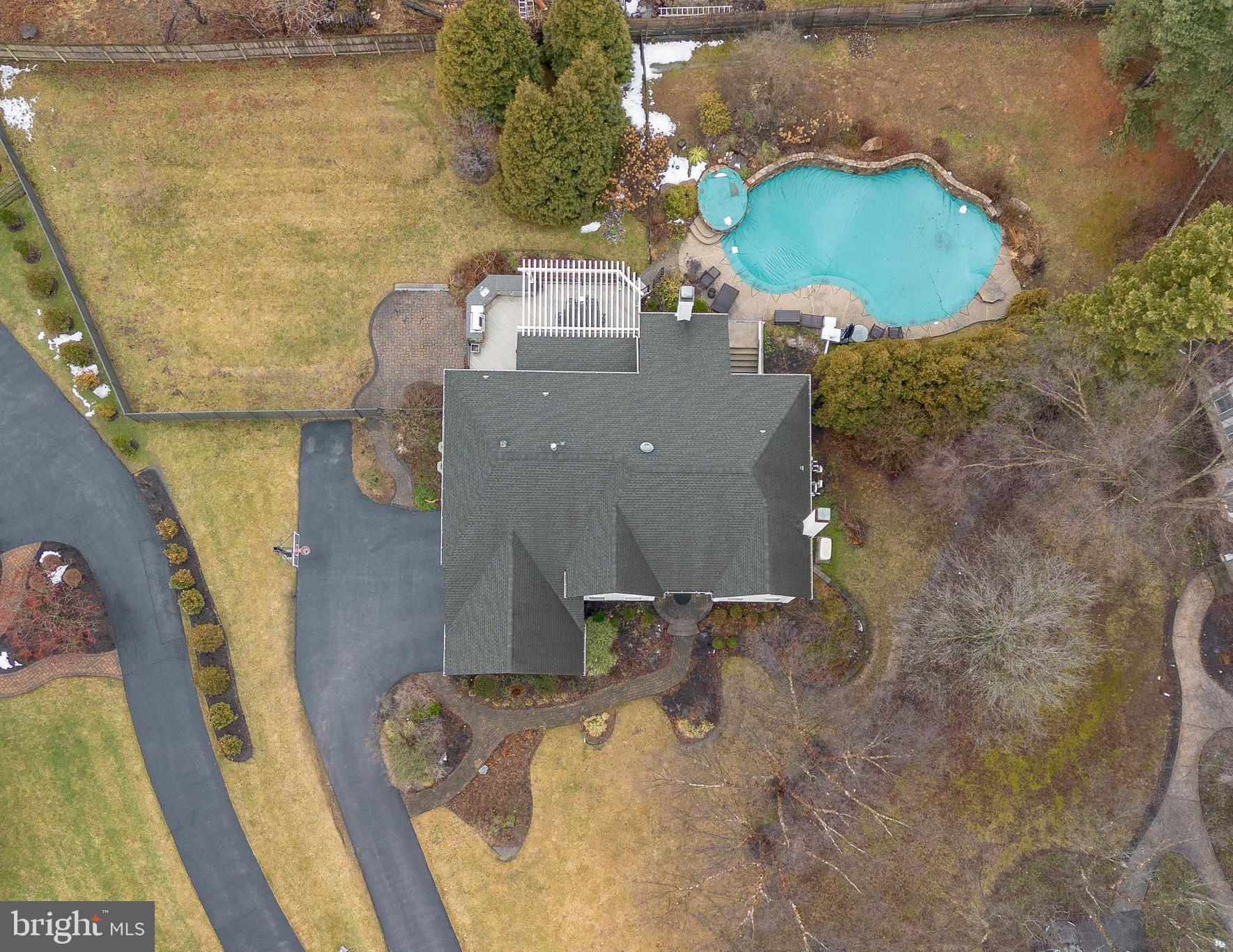 300 Bell Court Exton, PA 19341 - Photo 76 of 79 an aerial view of a house with outdoor space and a lake view