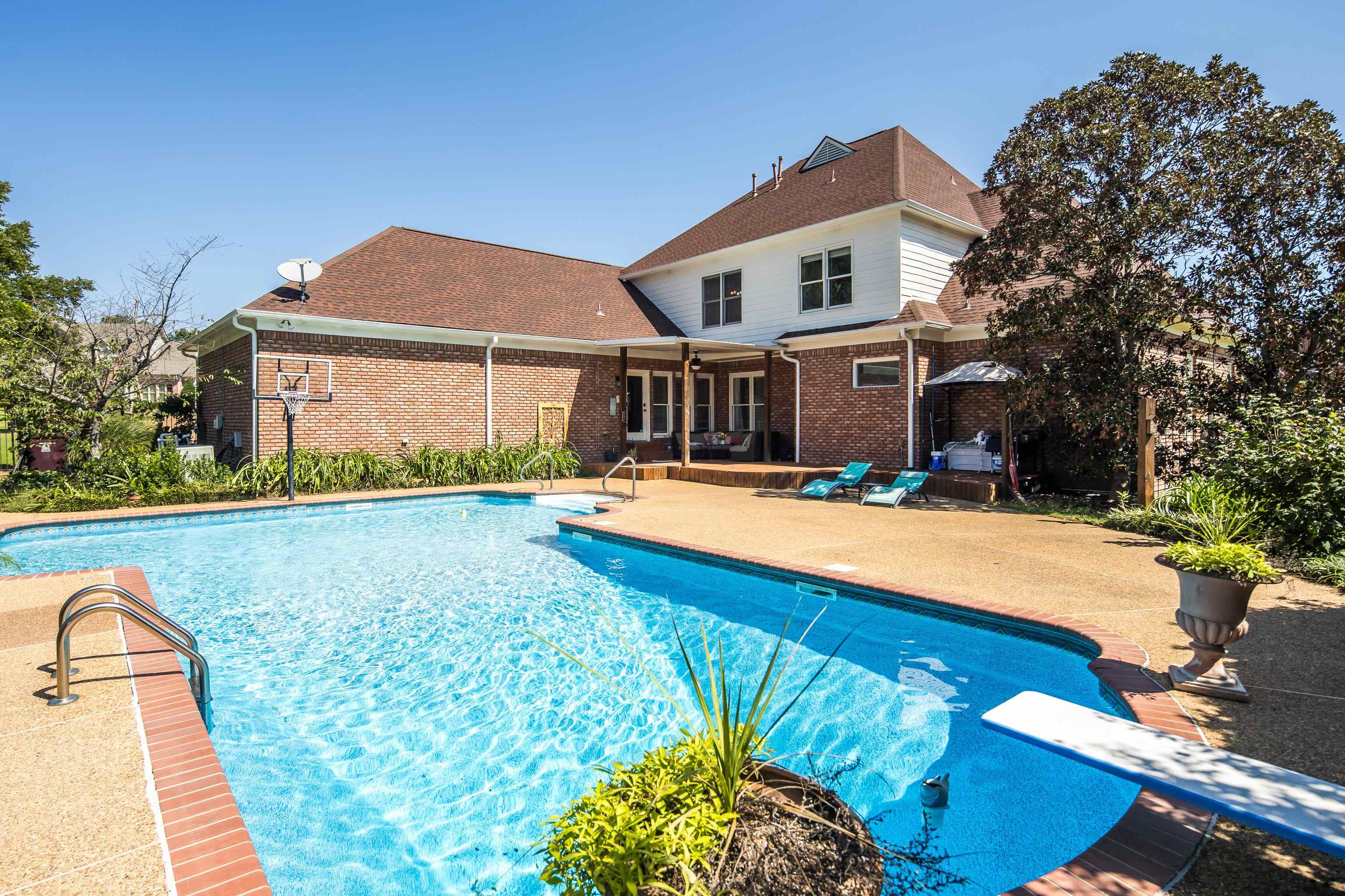 1323 Colbert Cove Collierville, TN 38017 - Photo 38 of 40 View of pool with a diving board and a patio