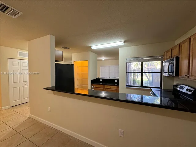 $359,990 | 22411 Southwest 88th Place, Unit 1426, Cutler Bay, FL 33190