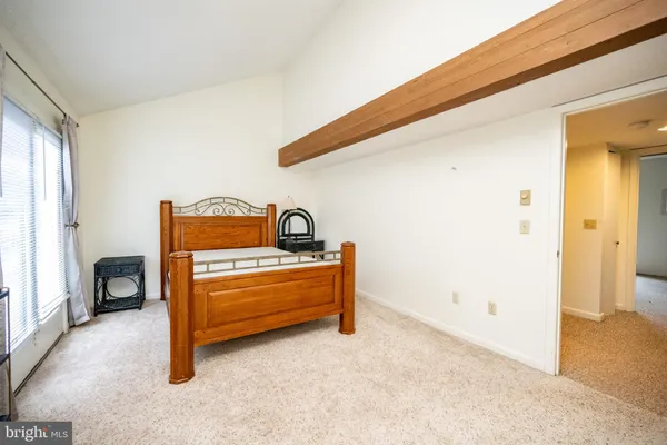 a room with a bed and a table