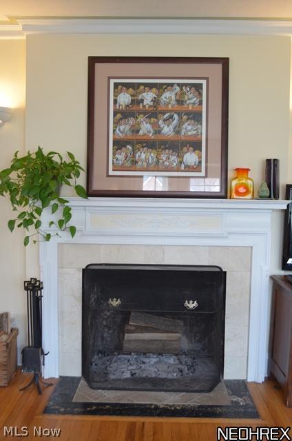 3290 Stockholm Road Cleveland, OH 44120 - Photo 4 of 16 Pretty detailing on the fireplace in the living room.