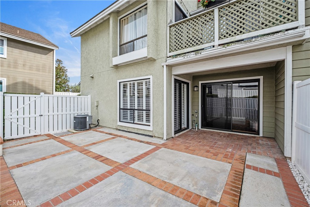 7 Oak Spring Lane, Unit 319 Aliso Viejo, CA 92656 - Photo 23 of 37 a view of a house with a wooden deck