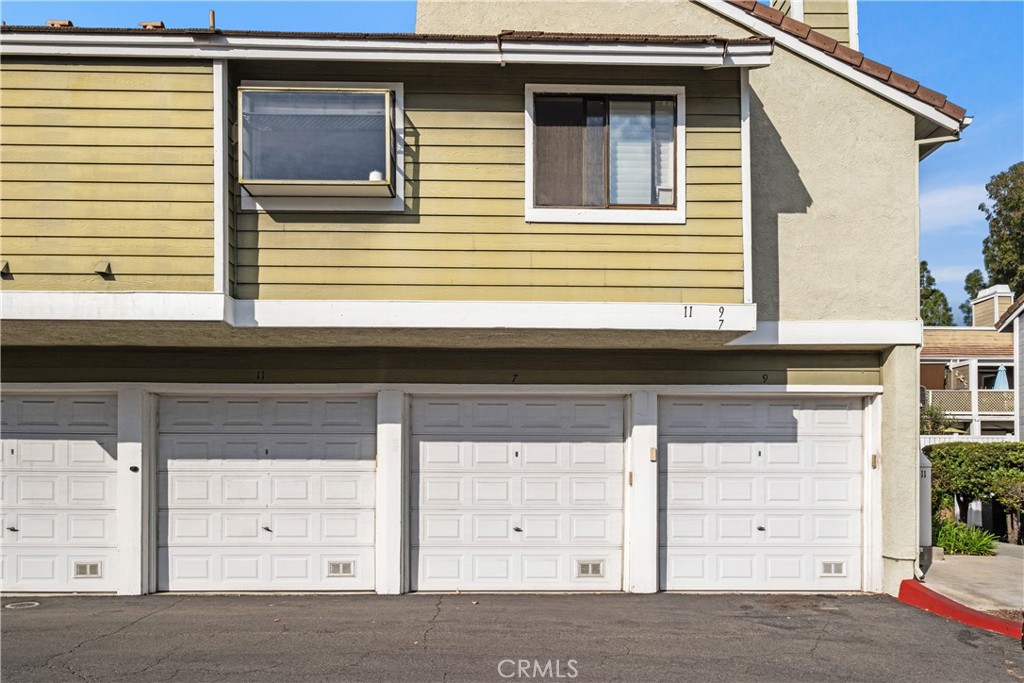 7 Oak Spring Lane, Unit 319 Aliso Viejo, CA 92656 - Photo 24 of 37 a front view of a house