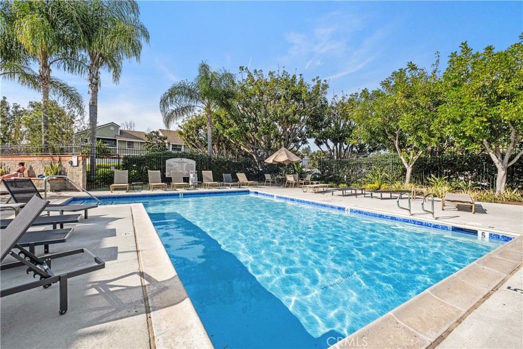 7 Oak Spring Lane, Unit 319 Aliso Viejo, CA 92656 - Photo 28 of 37 a view of swimming pool with sitting area