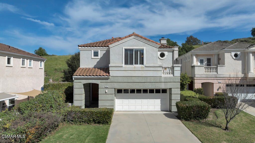 3842 Timberridge Road Moorpark, CA 93021 - Photo 1 of 75 a front view of a house with a garden and plants