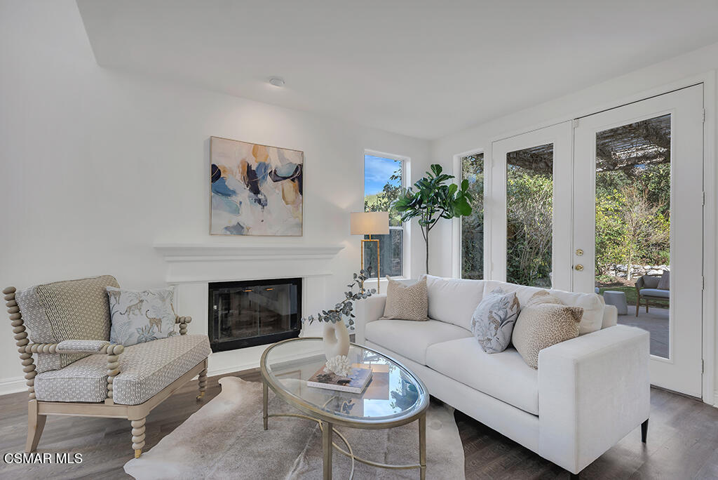 3842 Timberridge Road Moorpark, CA 93021 - Photo 12 of 75 a living room with furniture and a fireplace