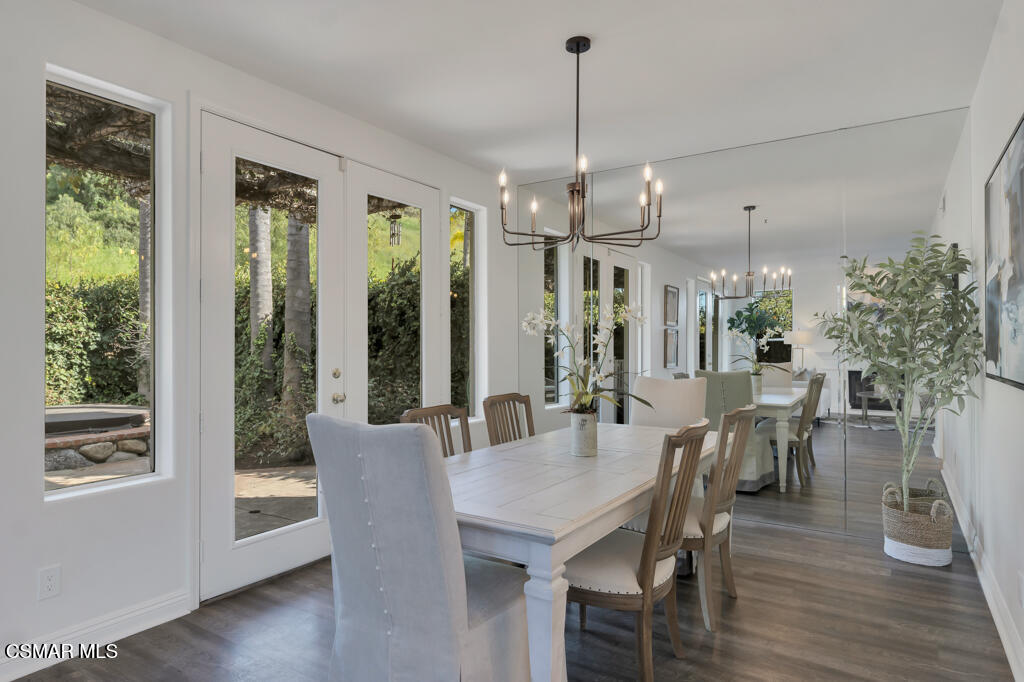 3842 Timberridge Road Moorpark, CA 93021 - Photo 15 of 75 a view of a dining room with furniture window and wooden floor