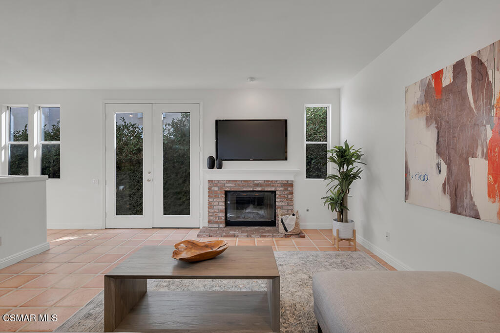 3842 Timberridge Road Moorpark, CA 93021 - Photo 24 of 75 a living room with furniture and a fireplace