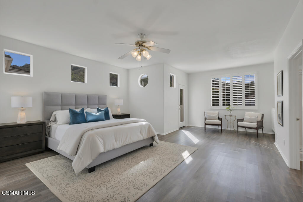 3842 Timberridge Road Moorpark, CA 93021 - Photo 28 of 75 a spacious bedroom with a bed and a couch