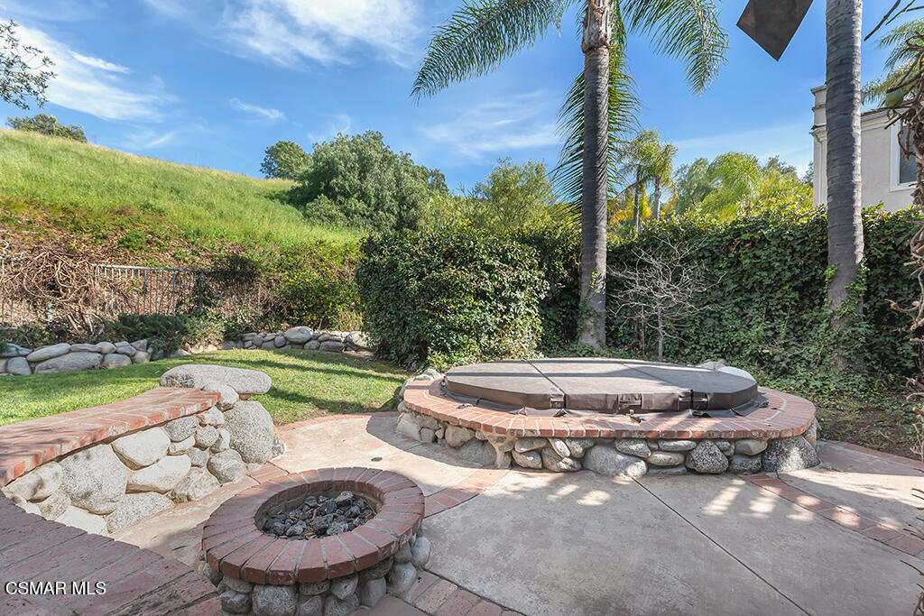 3842 Timberridge Road Moorpark, CA 93021 - Photo 54 of 75 a view of a swimming pool with a yard and furniture