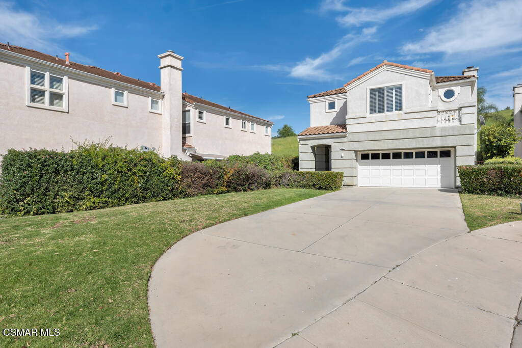 3842 Timberridge Road Moorpark, CA 93021 - Photo 70 of 75 a front view of a house with a yard