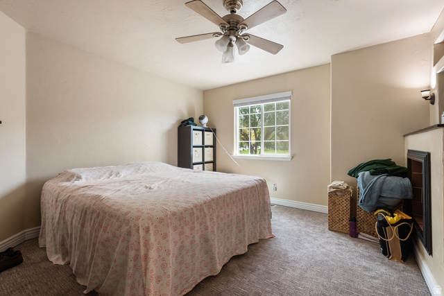 802 Brookside Court Payson, UT 84651 - Photo 22 of 32 Bedroom featuring carpet flooring and ceiling fan