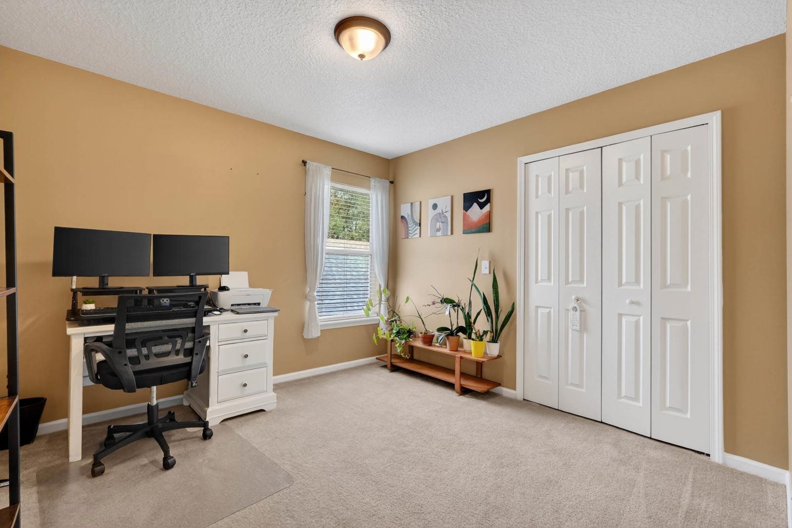 1237 Splendid Ravine Street St. Augustine, FL 32092 - Photo 25 of 62 a view of a workspace with furniture and a window