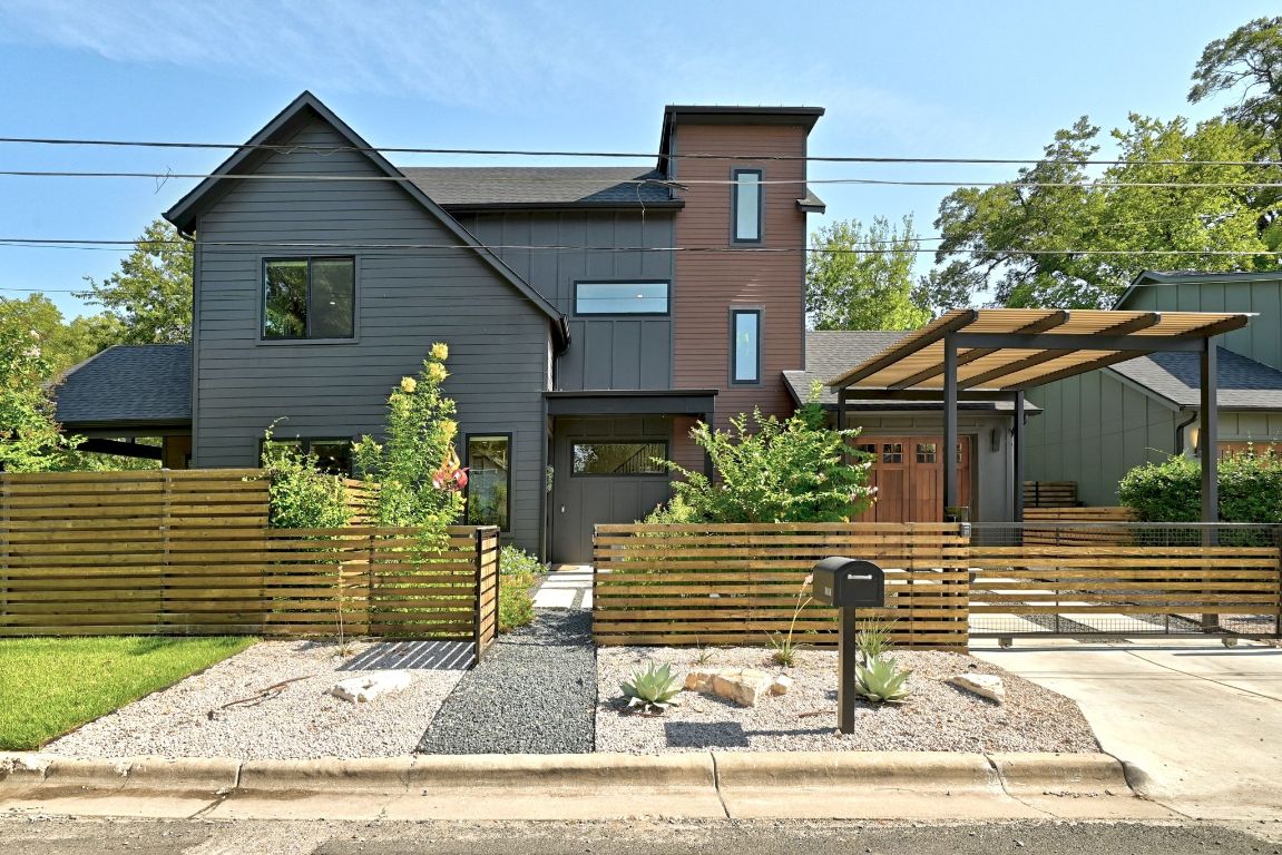 Front of home with full fence