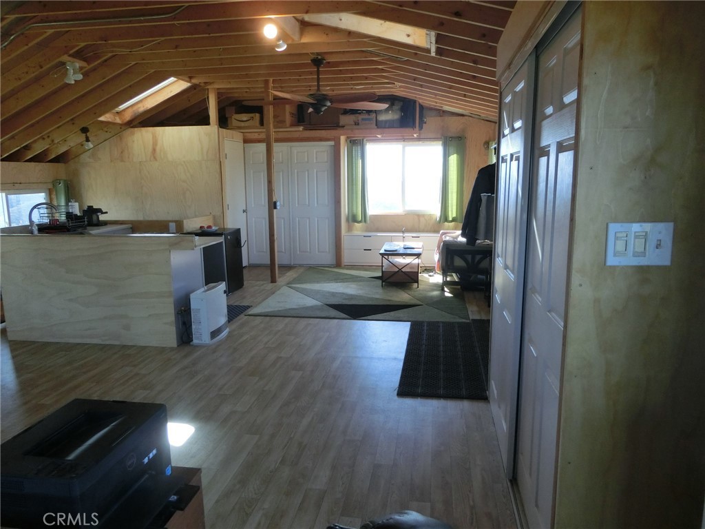 864 Watertrough Road Clearlake Oaks, CA 95423 - Photo 15 of 58 a view of a living room and a wooden floor
