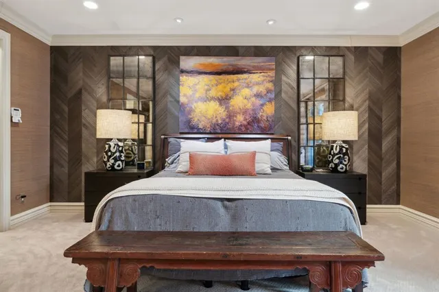 a bedroom with a bed and window