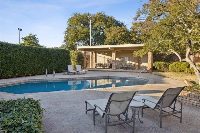 a view of a chairs and table on the terrace