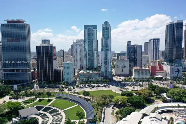 a view of a city with tall buildings