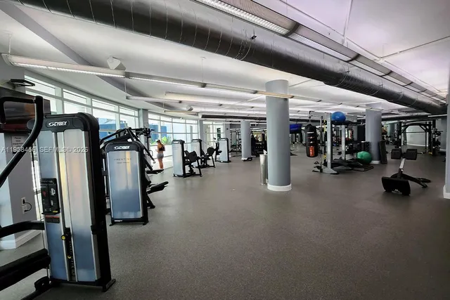 a view of a room with gym equipment