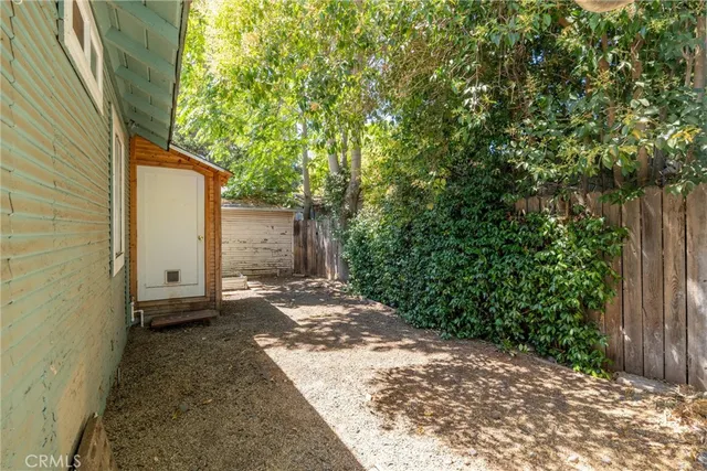 a backyard of a house with lots of green space