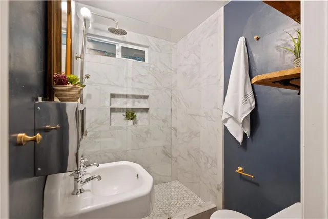 a bathroom with a sink and mirror