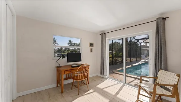a view of a livingroom with furniture and front door