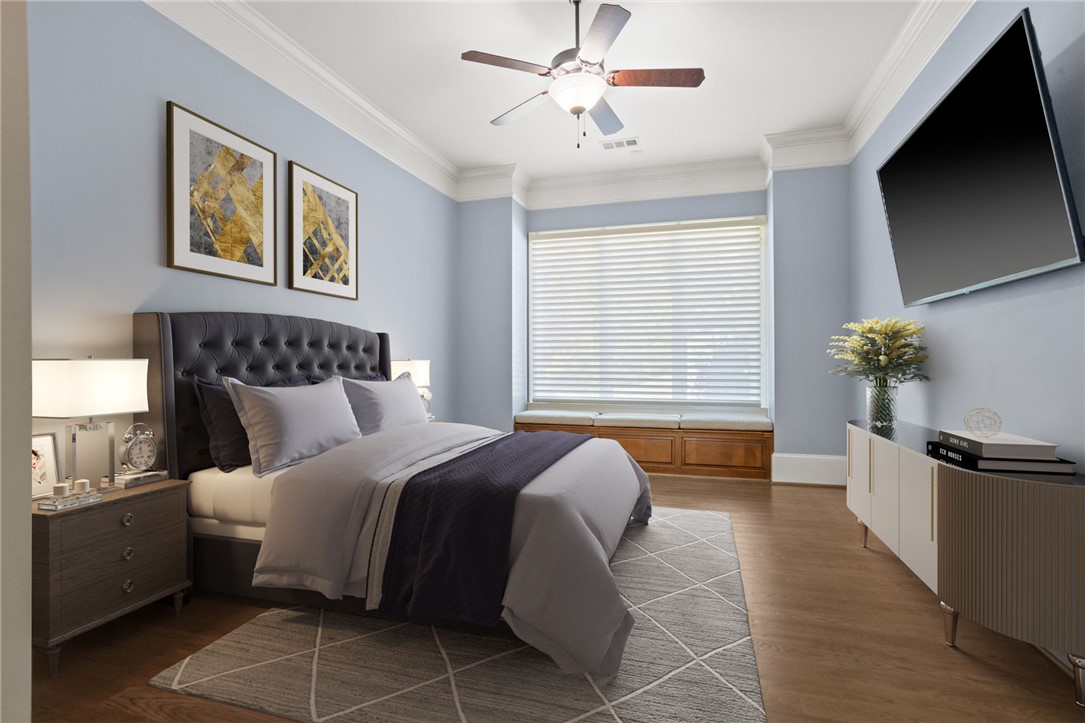314 Palmer Way Sunset, SC 29685 - Photo 19 of 48 Rich wood flooring and deep crown molding frame a sunlit window seat in this bedroom.