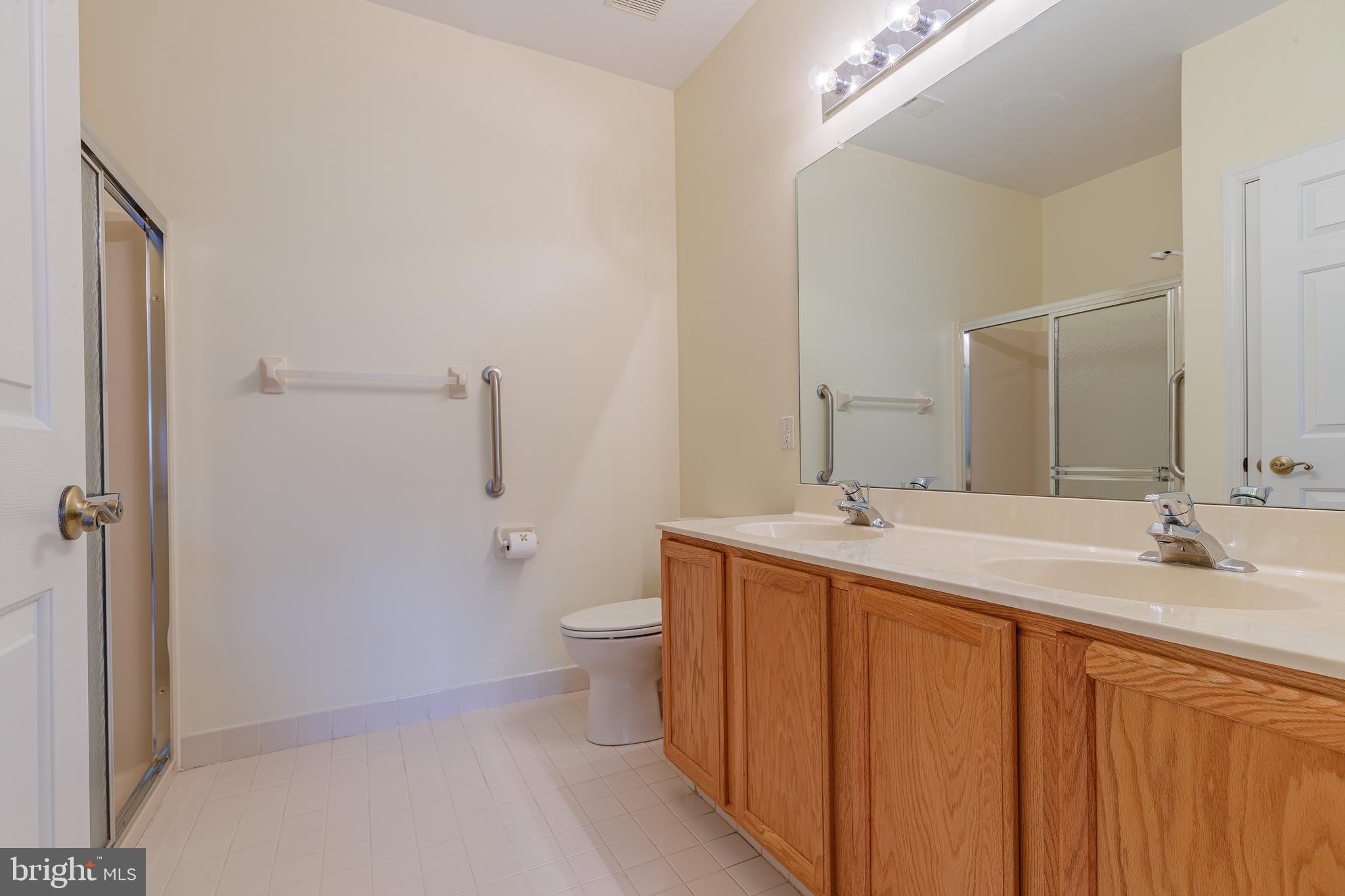 1549 Nicklaus Drive Springfield, PA 19064 - Photo 32 of 45 Master Bath with double sink vanity and shower