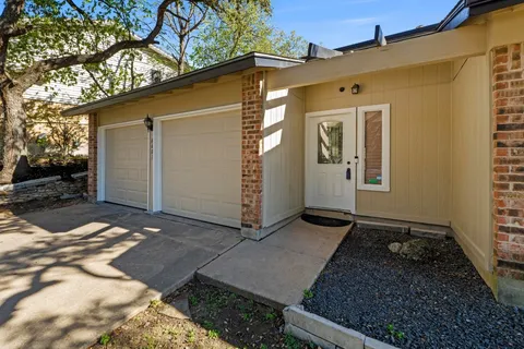 a front view of a house with windows