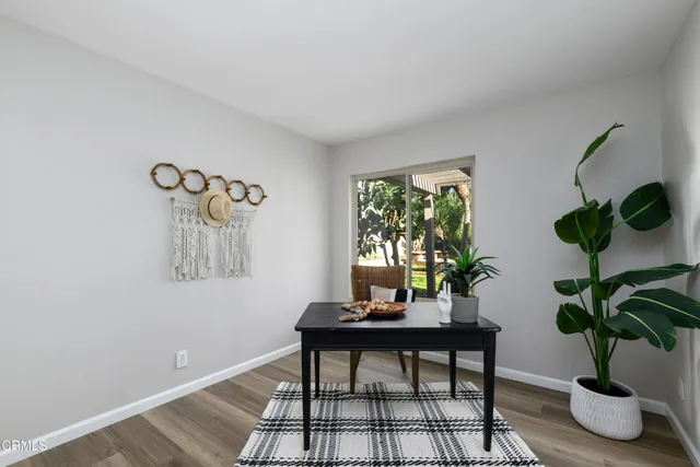 a view of a workspace with furniture